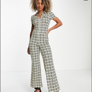 ASOS DESIGN collar zip-front 70’s jumpsuit in geo print